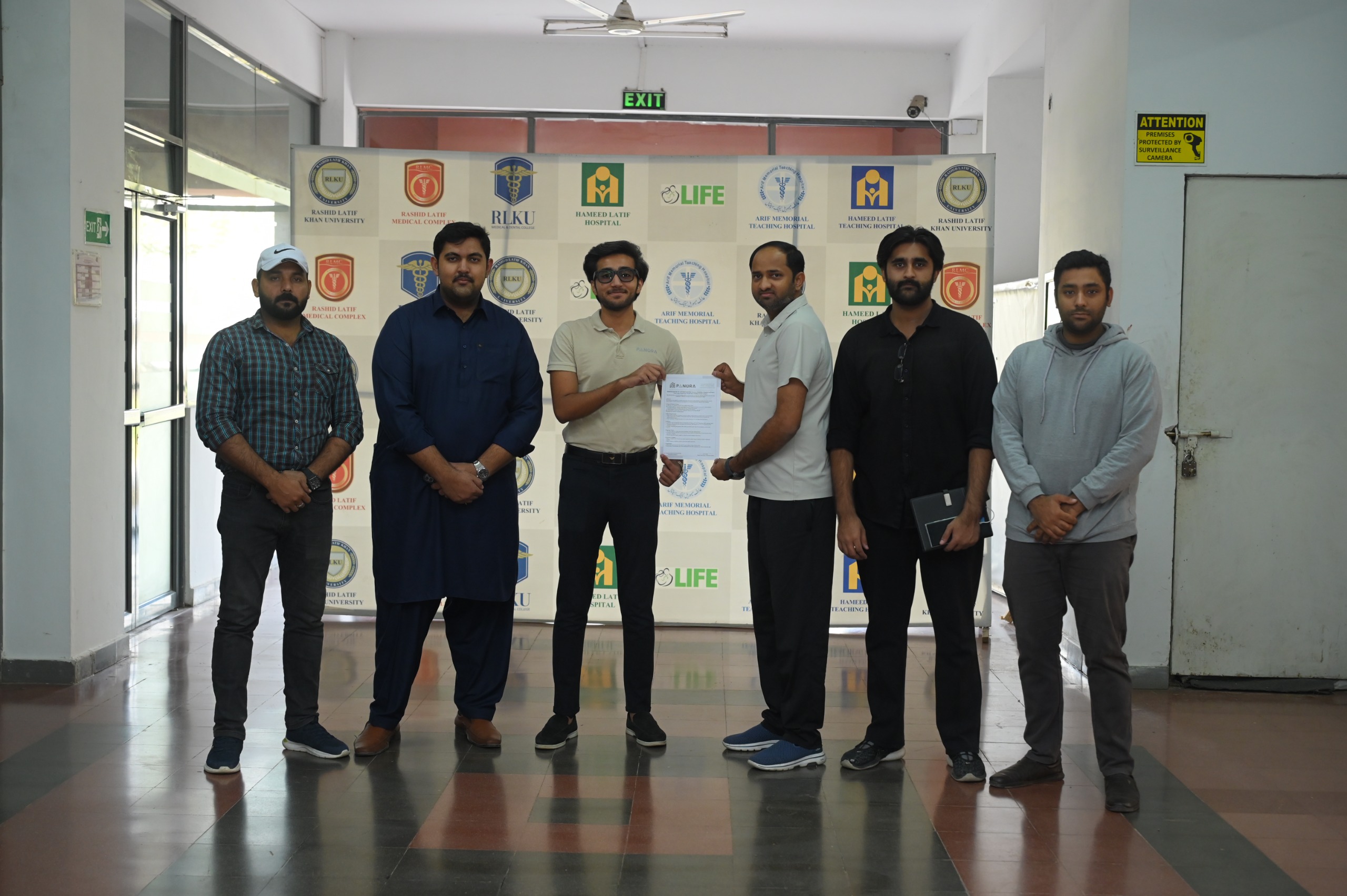 Panora and Rashid Latif Group at the signing of a group-level contract